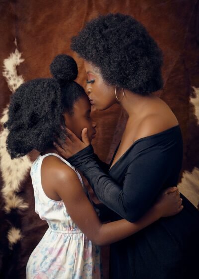 a couple of women standing next to each other