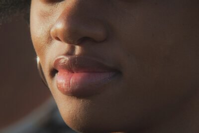 A close up of a person with a hat on